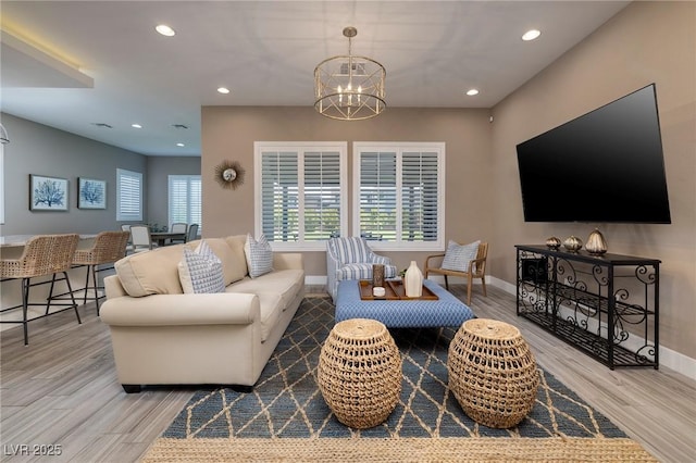 10349 Bressana Dr, Las Vegas, NV 89135 - living area with wood finished floors, a chandelier, and recessed lighting