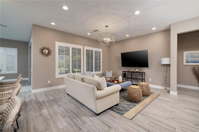 10349 Bressana Dr, Las Vegas, NV 89135 - living room with a chandelier, recessed lighting, and light wood-style floors