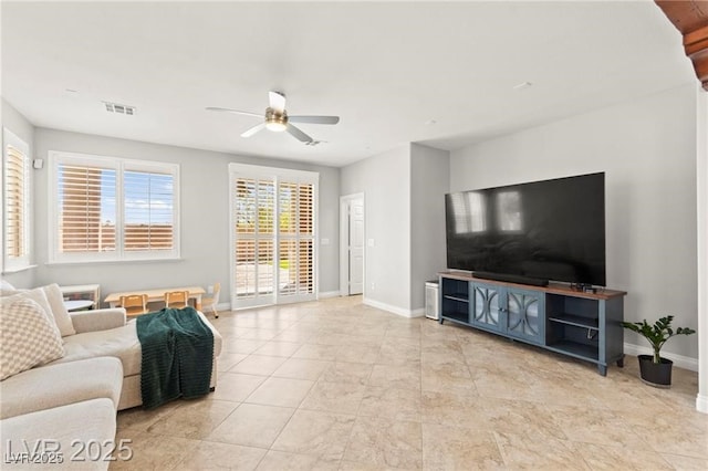 11274 Civita St, Las Vegas, NV 89141 - living area with ceiling fan and light tile patterned floors