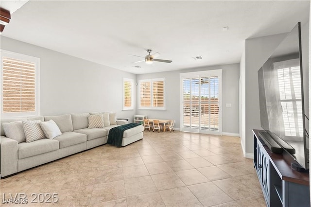 11274 Civita St, Las Vegas, NV 89141 - living area featuring a ceiling fan and light tile patterned floors