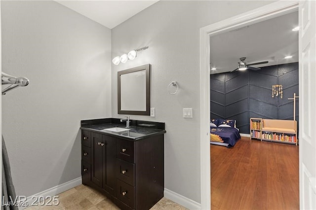 11274 Civita St, Las Vegas, NV 89141 - bathroom with vanity, ceiling fan, and wood finished floors