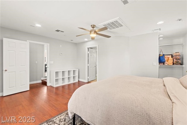 11274 Civita St, Las Vegas, NV 89141 - bedroom with wood finished floors, recessed lighting, and a ceiling fan