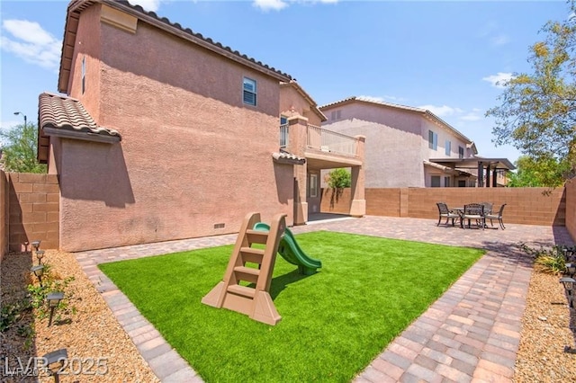 11274 Civita St, Las Vegas, NV 89141 - fenced backyard with a balcony and a patio area