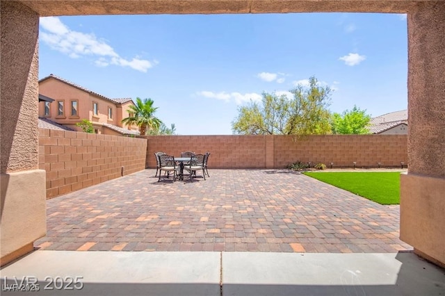 11274 Civita St, Las Vegas, NV 89141 - fenced backyard with outdoor dining area and a patio area