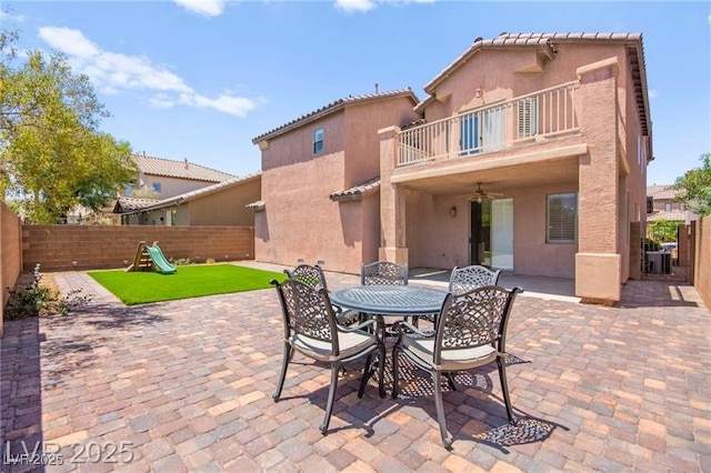 11274 Civita St, Las Vegas, NV 89141 - patio / terrace featuring a fenced backyard, a patio, a playground, and ceiling fan