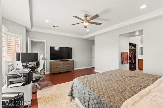 11274 Civita St, Las Vegas, NV 89141 - bedroom featuring wood finished floors, recessed lighting, a desk, a ceiling fan, and a spacious closet