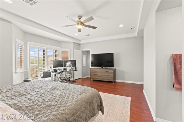 11274 Civita St, Las Vegas, NV 89141 - bedroom with dark wood-type flooring, a raised ceiling, recessed lighting, and a ceiling fan