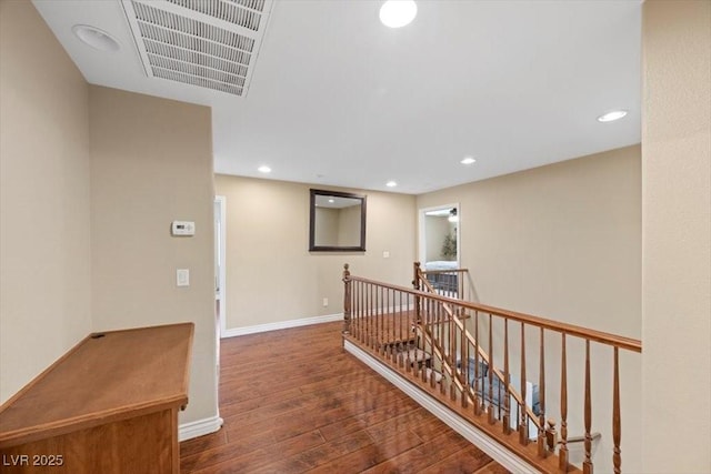 7028 Weavers Pl, North Las Vegas, NV 89084 - hallway with an upstairs landing, hardwood / wood-style flooring, and recessed lighting