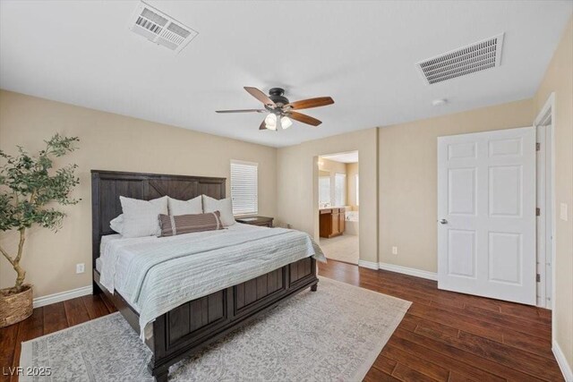 7028 Weavers Pl, North Las Vegas, NV 89084 - bedroom with wood finished floors, ensuite bath, and a ceiling fan