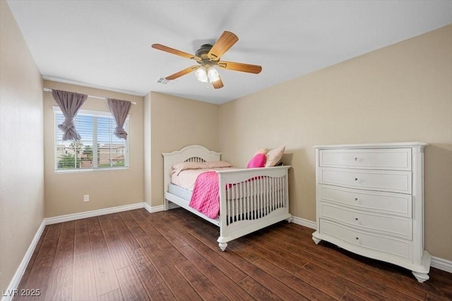 7028 Weavers Pl, North Las Vegas, NV 89084 - bedroom featuring dark wood-style flooring and ceiling fan