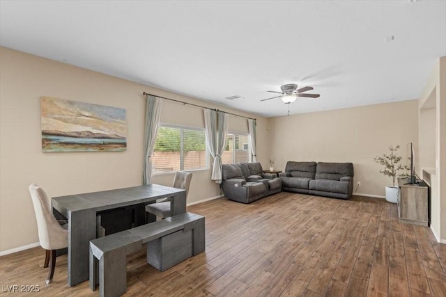 7028 Weavers Pl, North Las Vegas, NV 89084 - living room with wood finished floors and ceiling fan