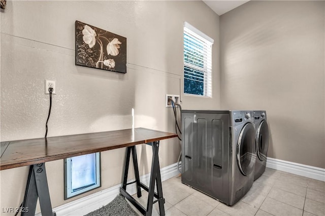 7670 Frittata Ave, Las Vegas, NV 89113 - laundry area featuring independent washer and dryer and light tile patterned floors