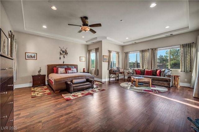 7670 Frittata Ave, Las Vegas, NV 89113 - bedroom featuring hardwood / wood-style flooring, a tray ceiling, recessed lighting, and a ceiling fan
