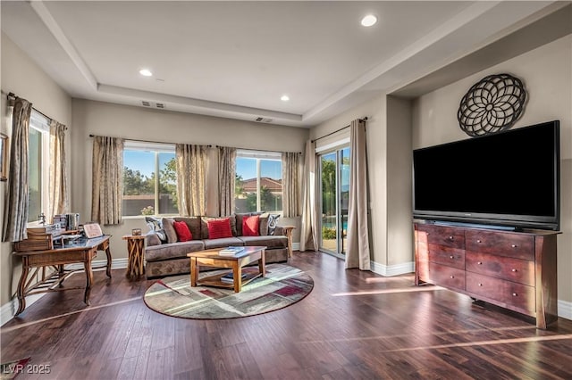 7670 Frittata Ave, Las Vegas, NV 89113 - living area featuring wood finished floors, a tray ceiling, and recessed lighting