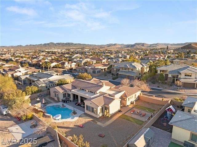 7670 Frittata Ave, Las Vegas, NV 89113 - aerial view of residential area featuring a mountainous background