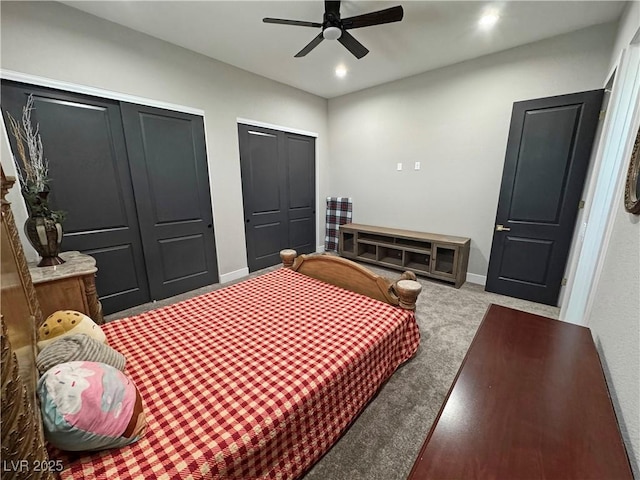2891 S Rainbow Ave, Pahrump, NV 89048 - bedroom featuring two closets, carpet, recessed lighting, and a ceiling fan