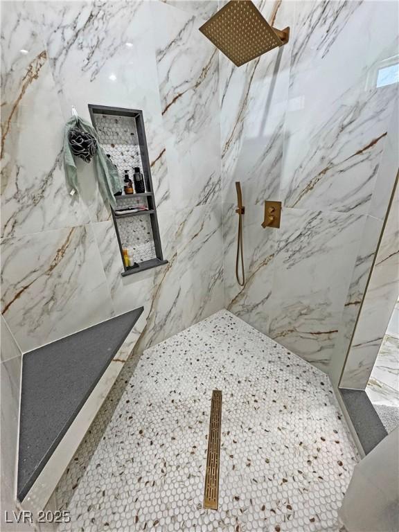 2891 S Rainbow Ave, Pahrump, NV 89048 - bathroom featuring a marble finish shower