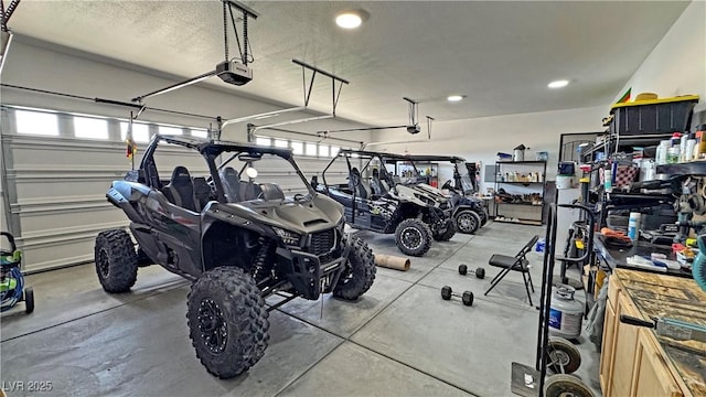 2891 S Rainbow Ave, Pahrump, NV 89048 - garage with a garage door opener and recessed lighting