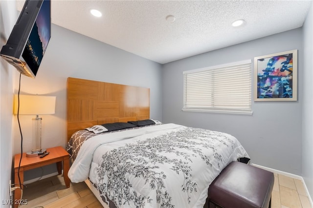 1012 Greystone Dr, Las Vegas, NV 89108 - bedroom featuring a textured ceiling and recessed lighting