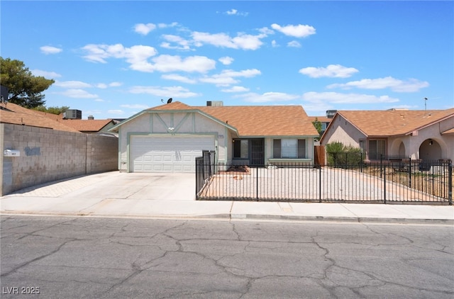 1012 Greystone Dr, Las Vegas, NV 89108 - single story home with concrete driveway, a garage, a fenced front yard, and stucco siding