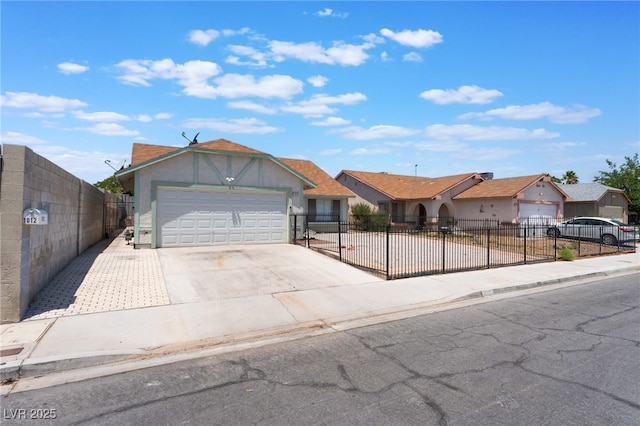 1012 Greystone Dr, Las Vegas, NV 89108 - view of front of property with a garage, driveway, a fenced front yard, and stucco siding
