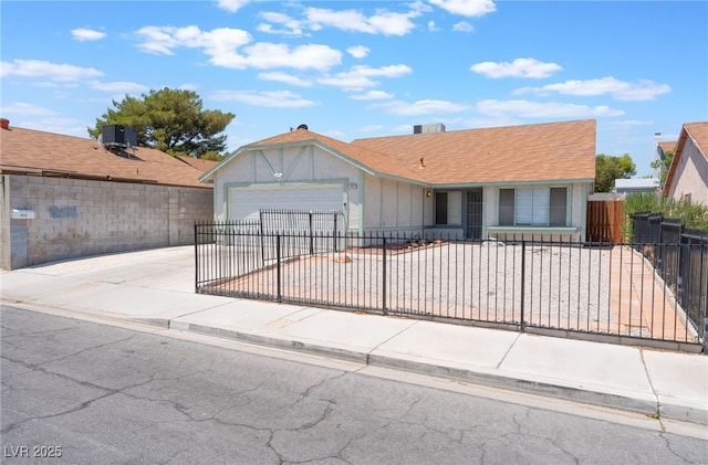 1012 Greystone Dr, Las Vegas, NV 89108 - ranch-style house with an attached garage, concrete driveway, and a fenced front yard