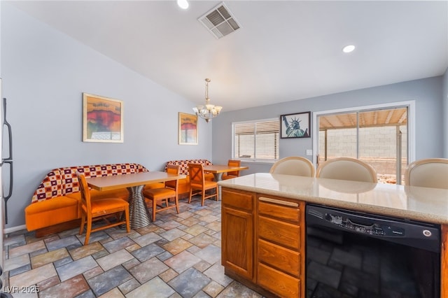 1012 Greystone Dr, Las Vegas, NV 89108 - kitchen featuring black dishwasher, stone finish flooring, a chandelier, hanging light fixtures, and vaulted ceiling