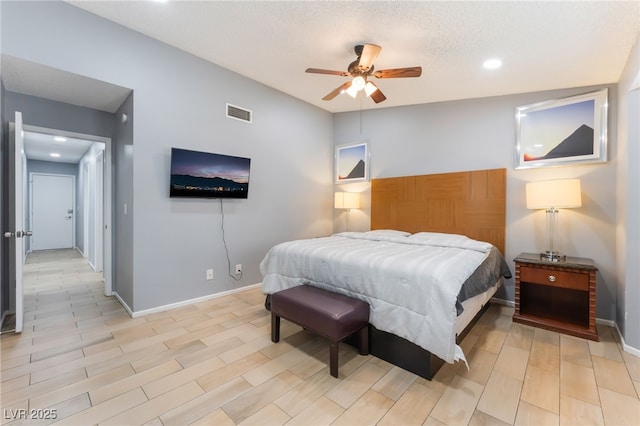 1012 Greystone Dr, Las Vegas, NV 89108 - bedroom with recessed lighting, light wood-style floors, ceiling fan, and a textured ceiling