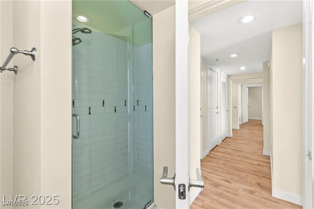 29 Montelago Blvd Unit 131, Henderson, NV 89011 - bathroom featuring a shower stall, wood finished floors, and recessed lighting