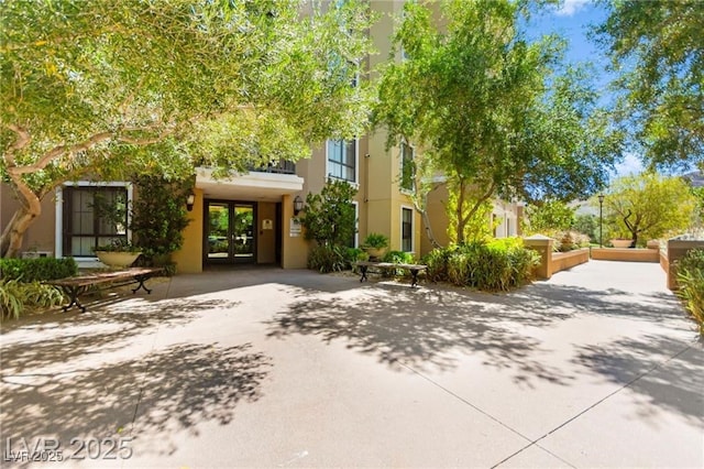 29 Montelago Blvd Unit 131, Henderson, NV 89011 - view of front of home featuring french doors and stucco siding