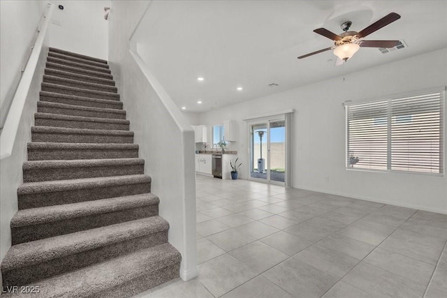 9054 Tangerine Tree Ct, Las Vegas, NV 89113 - staircase featuring tile patterned floors, a ceiling fan, and recessed lighting