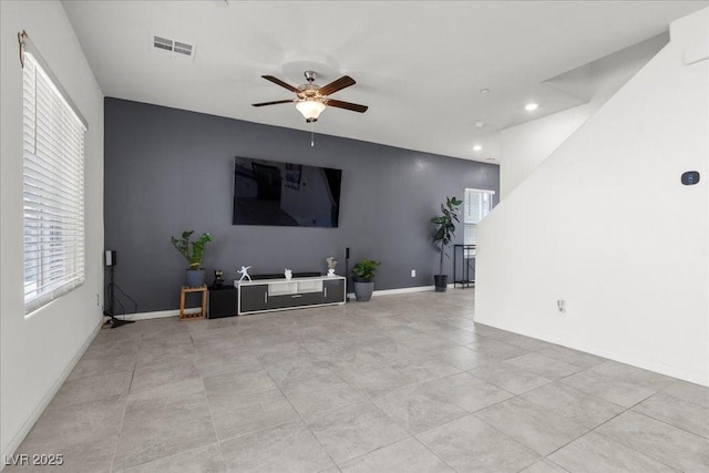 9054 Tangerine Tree Ct, Las Vegas, NV 89113 - living room featuring a ceiling fan and recessed lighting