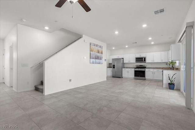 9054 Tangerine Tree Ct, Las Vegas, NV 89113 - unfurnished living room featuring recessed lighting, stairs, ceiling fan, and light tile patterned flooring
