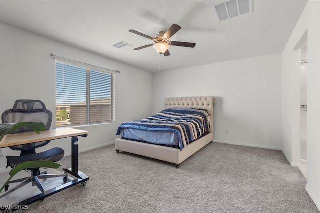9054 Tangerine Tree Ct, Las Vegas, NV 89113 - carpeted bedroom with a desk and ceiling fan