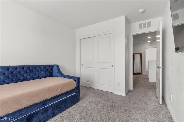 9054 Tangerine Tree Ct, Las Vegas, NV 89113 - bedroom with carpet flooring and a closet
