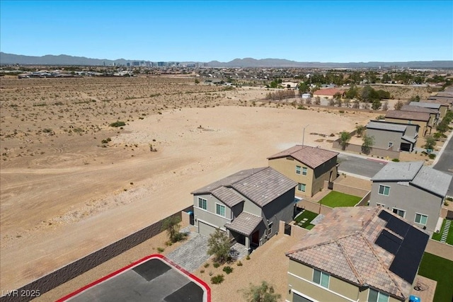 9054 Tangerine Tree Ct, Las Vegas, NV 89113 - aerial perspective of suburban area featuring property parcel outlined and a mountain backdrop