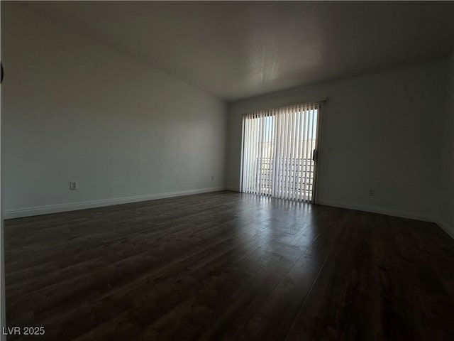 6250 W Flamingo Rd Unit 88, Las Vegas, NV 89103 - empty room featuring dark wood-style flooring and baseboards