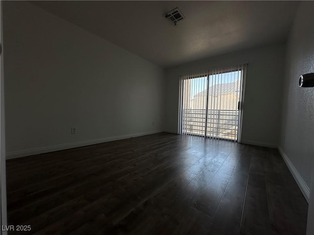 6250 W Flamingo Rd Unit 88, Las Vegas, NV 89103 - unfurnished room with dark wood finished floors and baseboards