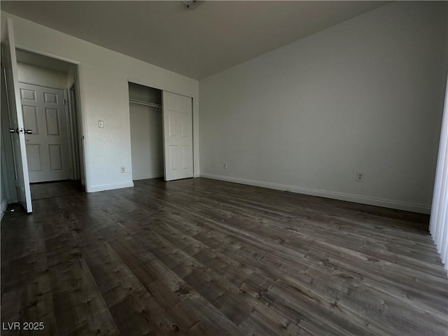 6250 W Flamingo Rd Unit 88, Las Vegas, NV 89103 - unfurnished bedroom with dark wood-style floors and a closet