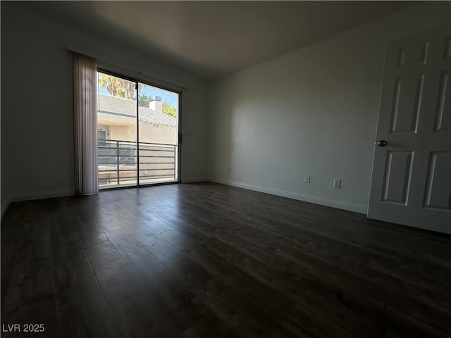 6250 W Flamingo Rd Unit 88, Las Vegas, NV 89103 - unfurnished room featuring dark wood-type flooring and baseboards