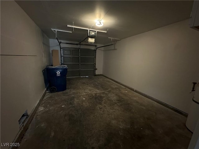 6250 W Flamingo Rd Unit 88, Las Vegas, NV 89103 - garage with baseboards and a garage door opener