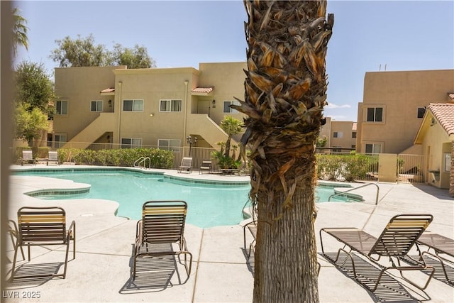 1836 N Decatur Blvd Unit 203, Las Vegas, NV 89108 - community pool featuring a patio