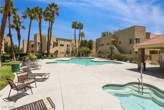 1836 N Decatur Blvd Unit 203, Las Vegas, NV 89108 - community pool with a residential view and a patio area