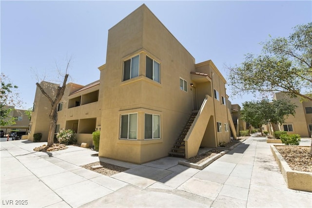 1836 N Decatur Blvd Unit 203, Las Vegas, NV 89108 - view of building exterior with stairs
