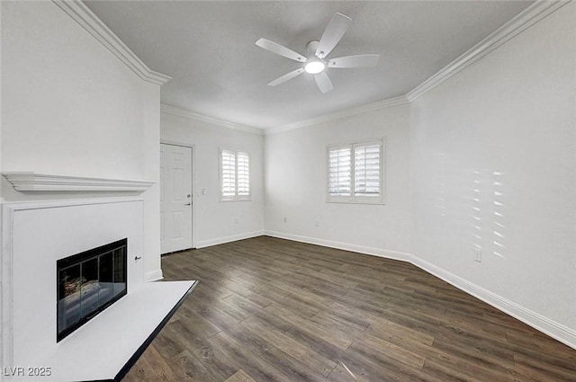 5250 S Rainbow Blvd Unit 1057, Las Vegas, NV 89118 - unfurnished living room featuring ornamental molding, ceiling fan, dark wood-type flooring, and a glass covered fireplace