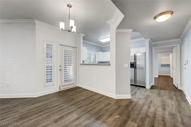 5250 S Rainbow Blvd Unit 1057, Las Vegas, NV 89118 - foyer featuring dark wood finished floors, a chandelier, and crown molding