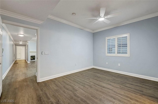 5250 S Rainbow Blvd Unit 1057, Las Vegas, NV 89118 - empty room featuring dark wood-style flooring, a ceiling fan, ornamental molding, and a smoke detector