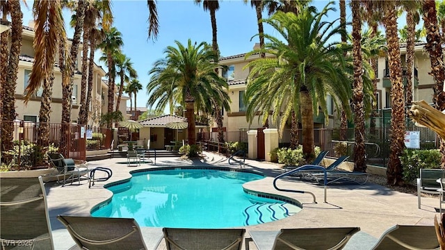 7163 S Durango Dr Unit 113, Las Vegas, NV 89113 - community pool featuring a patio