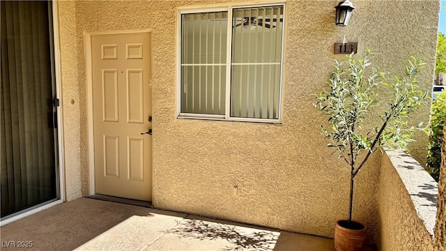 7163 S Durango Dr Unit 113, Las Vegas, NV 89113 - entrance to property featuring stucco siding