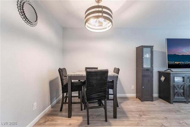 1407 Dorothy Ave Unit 2, Las Vegas, NV 89119 - dining space with baseboards and light wood-type flooring
